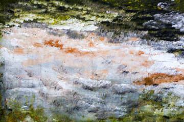 Abstract creative background of chaotic strokes of old cracked paint on concrete wall. Old surface with traces of paint, weathered, scratches and cracks for design