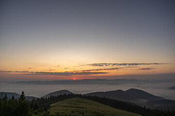 Sunrise, foggy morning in the Carpathian