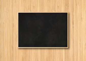blackboard on a wooden wall background
