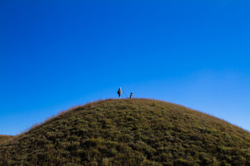 hiker on top of mountain