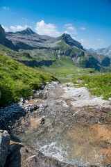 Fototapeta na wymiar Spiggenbach on Alp Hohkien in Kiental