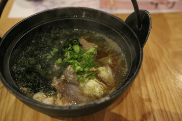 Japanese hot pot on wood desk