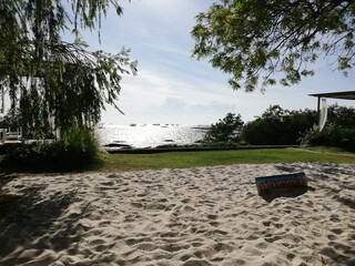 Tea Time at Bang Saen Beach, the closet pleasant beach getaway spot from Bangkok. Translation: “Please take off your shoes”  