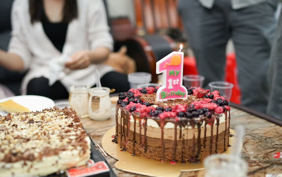 My First Birthday Cake, Chocolate Cake Decorated With Fresh Berries, Home Birthday Party, Homemade Cake With Lit Candle 