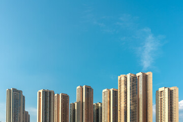 Fototapeta na wymiar residential buildings with blue sky for copy space.