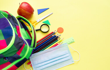 School supplies on yellow background. Back to school concept. New school year 2020. Flat lay. Copy space.