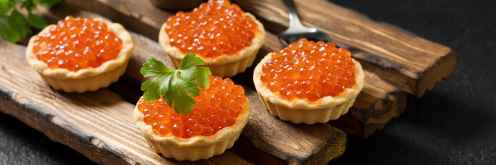 Red caviar close-up. Banner with space for text