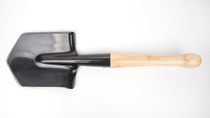 small shovel for tourism and earthworks on a white background
