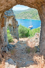 The sea view from the ruined arch of St. Nicholas church on Gemiler Island, Fethiye, Turkey
