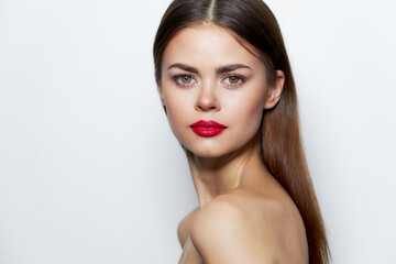 Fototapeta premium Attractive woman Bare Shoulders Red Lips Studio Model clear skin