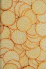 Several yellow Crackers combined.