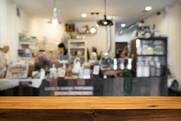 Empty wooden table space platform and blurred restaurant or coffee shop background for product...