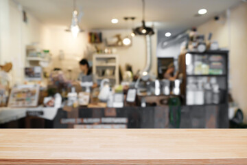 Empty wooden table space platform and blurred restaurant or coffee shop background for product...