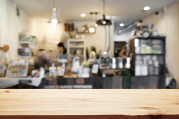 Empty wooden table space platform and blurred restaurant or coffee shop background for product display montage.