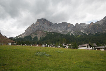 Fototapeta na wymiar View of San Martino di Castrozza mountain town during summer day in Trentino, Italy