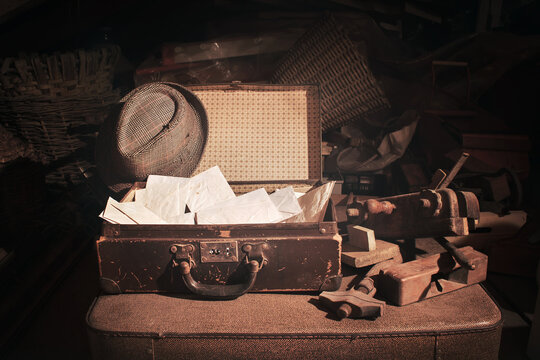 vintage suitcase with letters, old object mysterious past story
