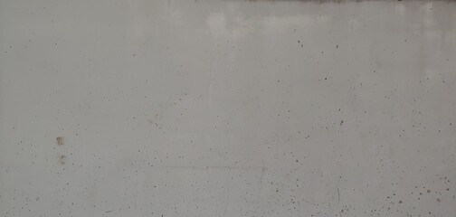 an old wall of white cement