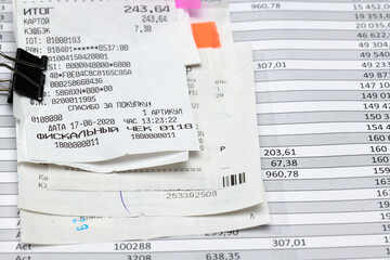 inscription in Russian - fiscal receipt, calculator and financial reports, analysis and accounting, various office items for bookkeeping