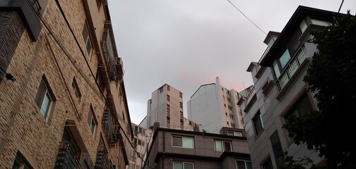 Apartments on top of buildings, behind apartments, again