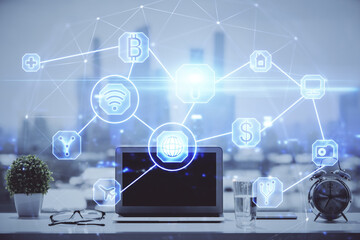 Computer on desktop with social network hologram. Double exposure. Concept of international people connections.