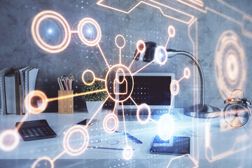 Computer on desktop with social network hologram. Double exposure. Concept of international people connections.