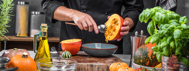 chef chopping pumpkins for pumpkin soup