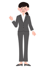 ポーズをとっているスーツ姿の女性