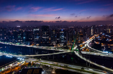 Fototapeta na wymiar The Octavio Frias de Oliveira bridge or Estaiada Bridge, a cable-stayed suspension bridge built over the Pinheiros River in the city of São Paulo, Brazil.