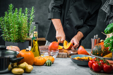 chef chopping pumpkins for pumpkin soup