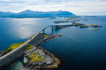 Cars crossing bridges on Atlanterhavsvegen, scenic coastal highway, west coast of Norway © STUEDAL