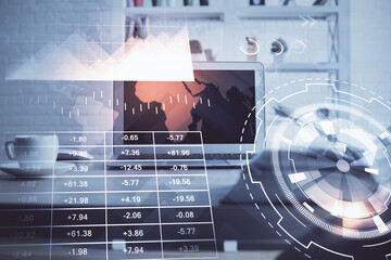 Stock market chart hologram drawn on personal computer background. Multi exposure. Concept of investment.