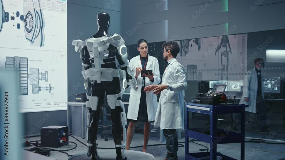 Aufkleber In Robotics Development: International Team of  Engineers and Scientists Work on Robotics Exoskeleton Prototype. Designing Powered Exosuit to Help Disabled People Walk Hard Labor Workers to Lift Goods