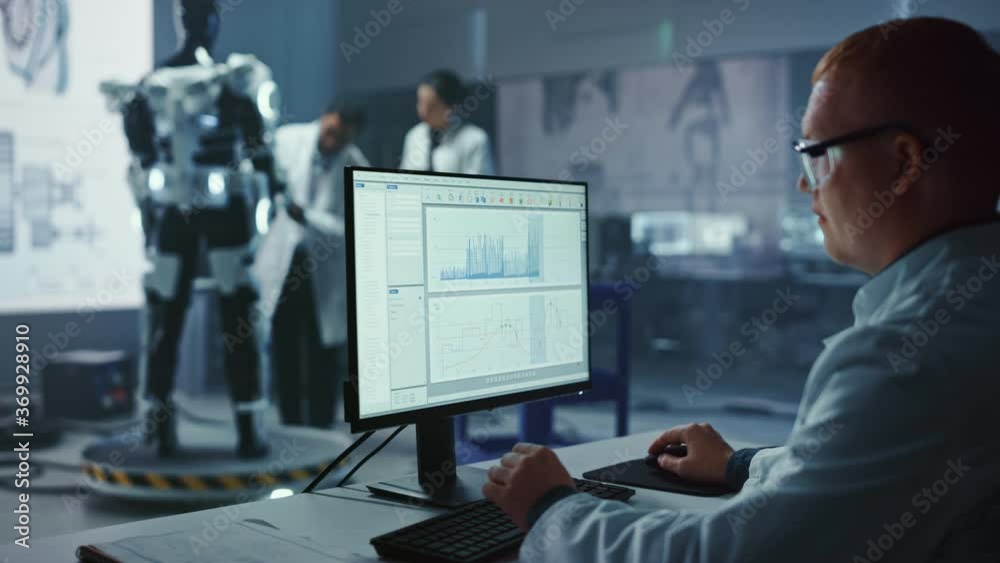 Fototapete in robotics development laboratory: chief analyst uses computer, female engineer, top male scientist