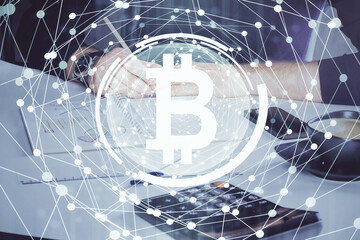 Man's hands working with notes background. Cryptocurrency and finance concept.