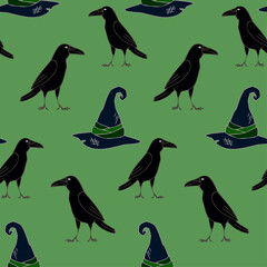 Seamless pattern with crows and hats on a green background
