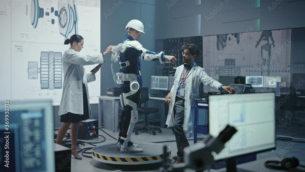 Aufkleber In Robotics Development Laboratory: Engineers and Scientists Work on a Bionics Exoskeleton Prototype with Person Testing it. Designing Wearable Exosuit to Help Disabled People, Warehouse Workers
