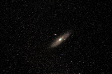 A wide view of the Andromeda Galaxy in outer space