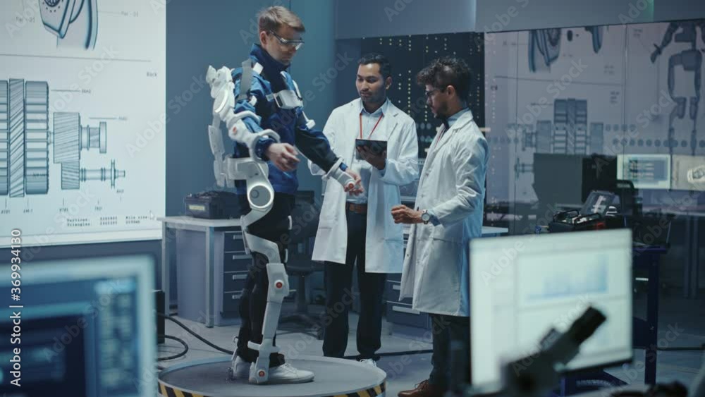 Aufkleber In Robotics Development Laboratory: Engineers and Scientists Work on a Bionics Exoskeleton Prototype with Person Testing it. Designing Wearable Exosuit to Help Disabled People, Warehouse Workers
