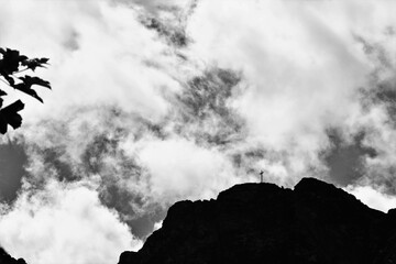 Giewont with cross on the top. Mountain massif in the Tatra Mountains of Poland. A mountain-symbol, whose profile is associated with the silhouette of a sleeping knight