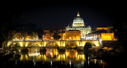 Naklejka na ściany i meble Vatican City: Saint Peter with bridge reflection by night