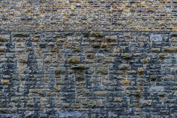 Wall of old bricks as background