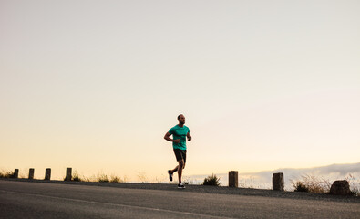 Obraz premium Man running on road