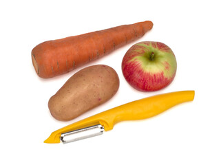 Yellow peeler on white background. Knife, peeler for vegetables and fruits