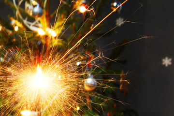 Lights. Sparks. Christmas background. Christmas lights close up. Celebration