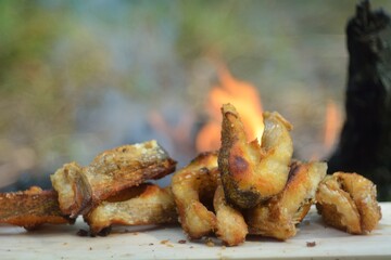 The preparation of the fish caught on fire.