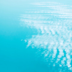 Beautiful sky background with white air clouds. Blur.