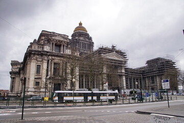 Fototapeta premium A Front view of one of the largest buildings constructed in the 19th century. The Court of Laws or Palace of Justice under reconstruction.
