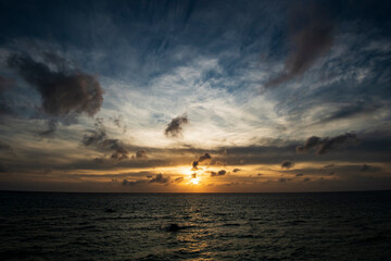 Naklejka na ściany i meble Beautiful Sunset over Ocean in Miyako Island, Okinawa Japan