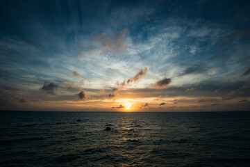 Fototapeta na wymiar Beautiful Sunset over Ocean in Miyako Island, Okinawa Japan