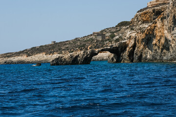 Fototapeta na wymiar Natural arch in the Mediterranean Sea.